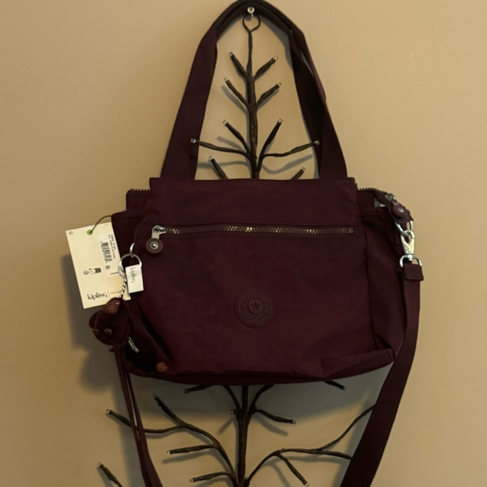 Brand new “Kipling “shoulder bag for women.Color-dark plum tonal.Size-14”x10”💜 - Picture 7 of 11